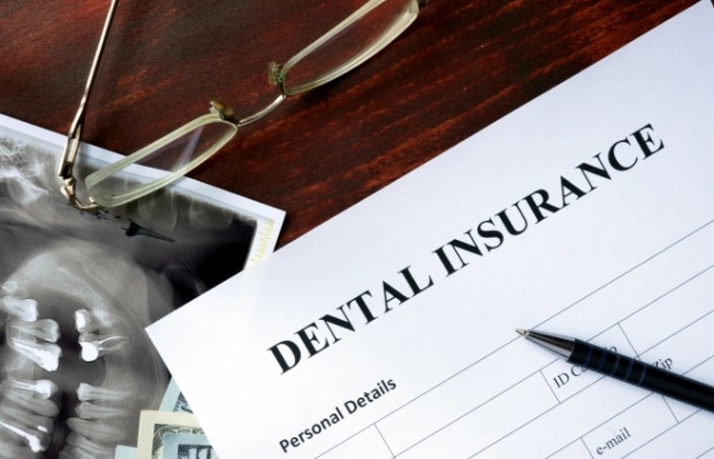 Dental insurance paperwork on desk