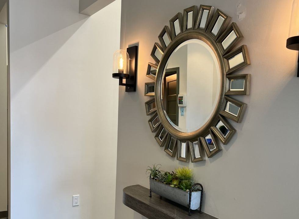 Circular mirror on wall