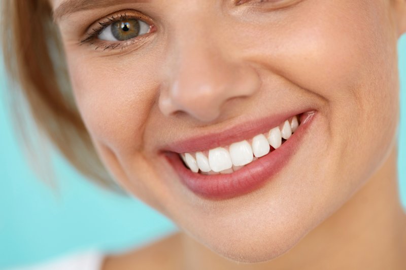 A closeup of a woman with a truly beautiful smile